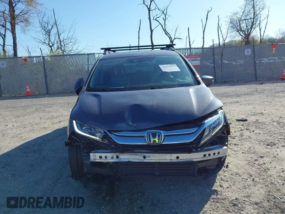 2020 Honda Odyssey EX with VIN 5FNRL6H54LB052660, listed as a IAAI auction lot 42051157 with 51,159 mi miles and . Bid and sale history available at DreamBid. Image 12.