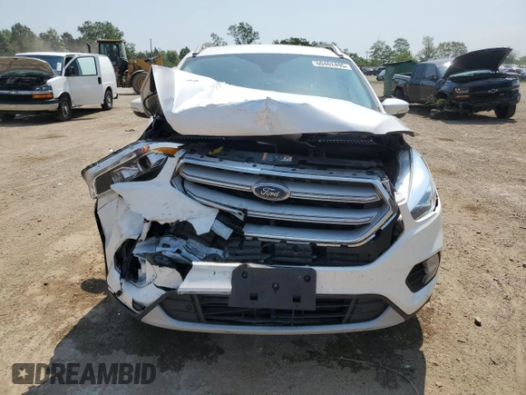 2019 Ford Escape Titanium z VIN 1FMCU9J93KUA51020, wystawiony jako Copart lot #60462495 z przebiegiem 59 998 mil mil oraz Szkoda całkowita • Salvage title. Historia ofert i sprzedaży dostępna na DreamBid. Obrazek 5.