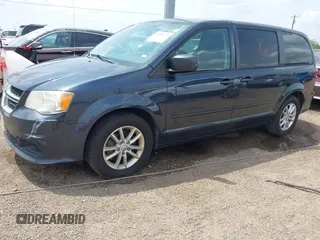 2013 Dodge Grand Caravan SXT with VIN 2C4RDGCGXDR749803, listed as a IAAI auction lot 42118722 with 264,454 mi miles and . Bid and sale history available at DreamBid. Image 2.