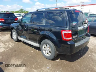 2010 Ford Escape Limited with VIN 1FMCU9E75AKD36580, listed as a IAAI auction lot 42335561 with 164,565 mi miles and . Bid and sale history available at DreamBid. Image 3.