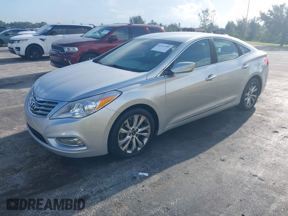 2014 Hyundai Azera z VIN KMHFG4JG9EA341354, wystawiony jako IAAI lot #42711386 z przebiegiem 144 157 mil mil oraz . Historia ofert i sprzedaży dostępna na DreamBid. Obrazek 2.