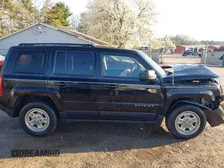 2016 Jeep Patriot Sport with VIN 1C4NJPBAXGD699514, listed as a IAAI auction lot 41945662 with 100,111 mi miles. Bid and sale history available at carsss.com. Image 14.