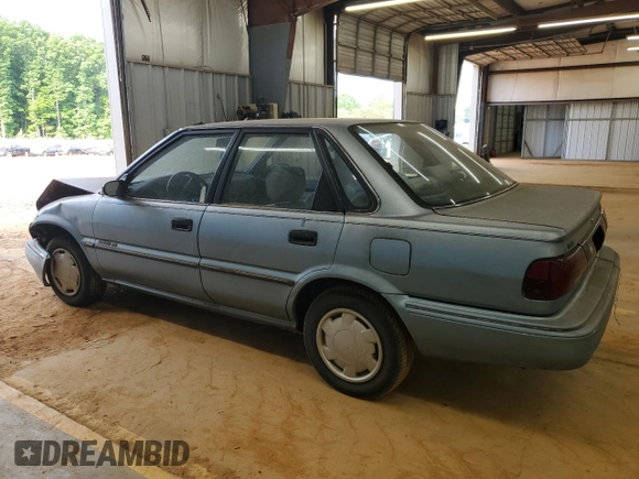 1992 Geo Prizm z VIN 1Y1SK5466NZ069241, wystawiony jako Copart lot #55314255 z przebiegiem 256 418 mil mil oraz Szkody całkowita. Historia ofert i sprzedaży dostępna na DreamBid. Obrazek 2.