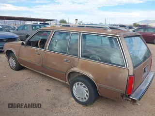 1983 Chevrolet Cavalier with VIN 1G1AD35P2DJ172197, listed as a IAAI auction lot 41692703 with 12,947 mi miles and . Bid and sale history available at DreamBid. Image 3.