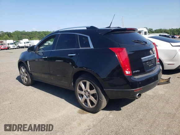 2011 Cadillac SRX Premium Collection with VIN 3GYFNFEYXBS547540, listed as a Copart auction lot 62563895 with 107,136 mi miles and Salvage title. Bid and sale history available at DreamBid. Image 2.