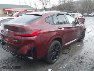 2022 BMW X4 M40i with VIN 5UX43DT09N9J96761, listed as a IAAI auction lot 41675333 with 1 mi miles. Bid and sale history available at carsss.com. Image 4.