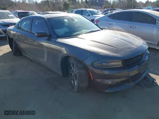 2015 Dodge Charger SXT with VIN 2C3CDXJG6FH832618, listed as a IAAI auction lot 41458100 with 63,769 mi miles. Bid and sale history available at carsss.com. Image 1.