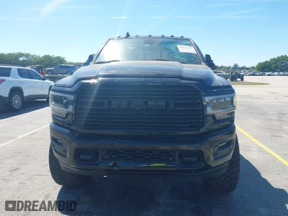 2019 Ram 2500 Laramie with VIN 3C6UR5FLXKG710325, listed as a IAAI auction lot 41853777 with 104,286 mi miles. Bid and sale history available at carsss.com. Image 6.