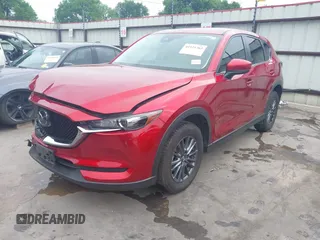 2019 Mazda CX-5 Touring with VIN JM3KFACM7K0696815, listed as a IAAI auction lot 41921763 with 46,900 mi miles. Bid and sale history available at carsss.com. Image 2.
