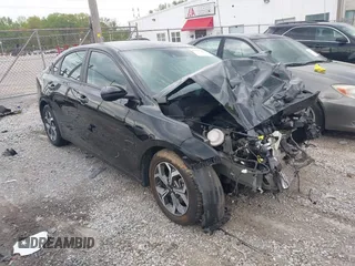 2021 Kia Forte LXS with VIN 3KPF24ADXME410282, listed as a IAAI auction lot 42004328 with 62,817 mi miles. Bid and sale history available at carsss.com. Image 1.