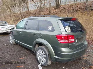 2018 Dodge Journey SE with VIN 3C4PDCABXJT496661, listed as a IAAI auction lot 41908124 with 82,257 mi miles. Bid and sale history available at carsss.com. Image 3.