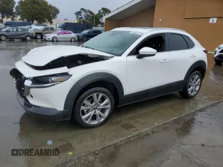 2021 Mazda CX-30 Premium with VIN 3MVDMADM4MM217643, listed as a Copart auction lot 45041145 with 27,774 mi miles and Salvage title. Bid and sale history available at DreamBid. Image 1.