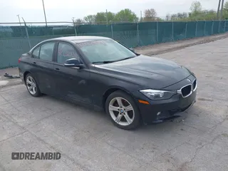 2015 BMW 3 Series 328i with VIN WBA3A5G57FNS87368, listed as a IAAI auction lot 42132939 with 115,289 mi miles. Bid and sale history available at carsss.com. Image 1.