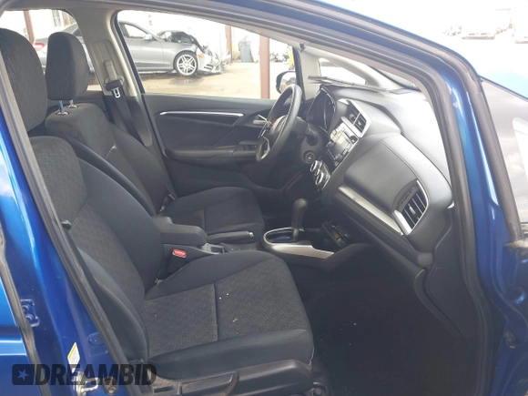 2015 Honda Fit LX z VIN 3HGGK5H51FM711607, wystawiony jako IAAI lot #42249495 z przebiegiem Nie podano mil oraz . Historia ofert i sprzedaży dostępna na DreamBid. Obrazek 5.