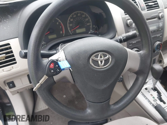 2011 Toyota Corolla L with VIN JTDBU4EE2B9158833, listed as a IAAI auction lot 42120661 with Not Provided miles. Bid and sale history available at carsss.com. Image 11.