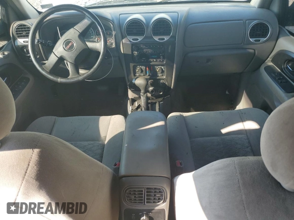 2005 GMC Envoy SLT with VIN 1GKDT13S552329269, listed as a Copart auction lot 69209244 with 154,595 mi miles and Salvage Title. Bid and sale history available at carsss.com. Image 8.