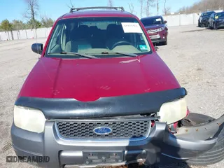 2004 Ford Escape XLT with VIN 1FMCU931X4KB19738, listed as a IAAI auction lot 41925561 with 220,674 mi miles. Bid and sale history available at carsss.com. Image 12.