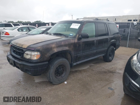2000 Ford Explorer XLS z VIN 1FMZU62X7YZB81285, wystawiony jako IAAI lot #42720506 z przebiegiem 92 852 mil mil oraz . Historia ofert i sprzedaży dostępna na DreamBid. Obrazek 2.