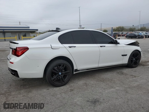 2013 BMW 7 Series 740i with VIN WBAYA6C55DC995290, listed as a Copart auction lot 82022284 with 128,882 mi miles and Salvage Title. Bid and sale history available at carsss.com. Image 3.