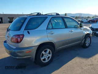 1999 Lexus RX 300 Luxury SUV with VIN JT6HF10U9X0046499, listed as a IAAI auction lot 41375447 with 149,629 mi miles. Bid and sale history available at carsss.com. Image 4.