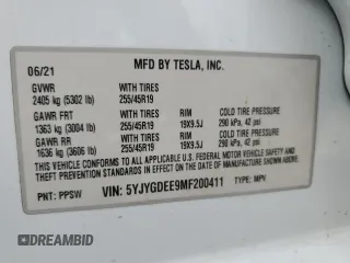 2021 Tesla Model Y Long Range z VIN 5YJYGDEE9MF200411, wystawiony jako Copart lot #53738075 z przebiegiem 97 546 mil mil oraz Szkoda całkowita • Salvage title. Historia ofert i sprzedaży dostępna na DreamBid. Obrazek 13.