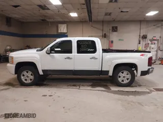 2007 Chevrolet Silverado 1500 LT w/2LT with VIN 2GCEK13MX71677513, listed as a IAAI auction lot 42023608 with 144,555 mi miles. Bid and sale history available at carsss.com. Image 14.