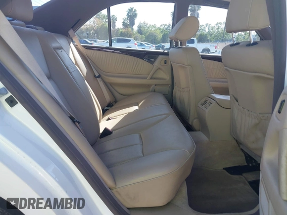 1996 Mercedes-Benz E 320 with VIN WDBJF55F1TJ014659, listed as a IAAI auction lot 42273213 with 151,584 mi miles and . Bid and sale history available at DreamBid. Image 8.