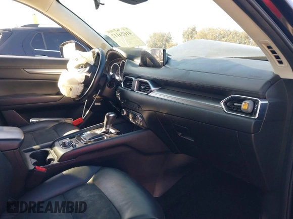 2017 Mazda CX-5 Touring with VIN JM3KFACL2H0146213, listed as a IAAI auction lot 41626112 with 77,829 mi miles and . Bid and sale history available at carsss.com. Image 5.