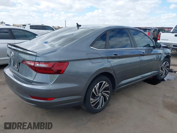 2020 Volkswagen Jetta SEL with VIN 3VWEB7BU8LM010315, listed as a IAAI auction lot 41702998 with 59,276 mi miles and . Bid and sale history available at DreamBid. Image 4.