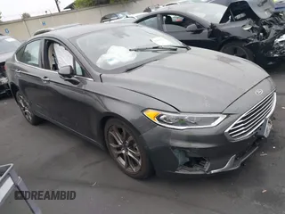 2020 Ford Fusion SEL with VIN 3FA6P0CD0LR137860, listed as a IAAI auction lot 42442924 with 64,998 mi miles and . Bid and sale history available at DreamBid. Image 1.