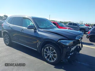 2020 BMW X5 sDrive40i with VIN 5UXCR4C01LLW64122, listed as a IAAI auction lot 42253989 with 76,789 mi miles and . Bid and sale history available at DreamBid. Image 1.