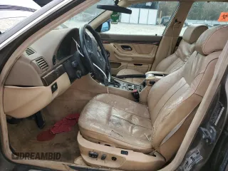 1997 BMW 7 Series 740il with VIN WBAGJ8325VDM01757, listed as a Copart auction lot 85734614 with 190,453 mi miles and Non Repairable. Bid and sale history available at carsss.com. Image 7.