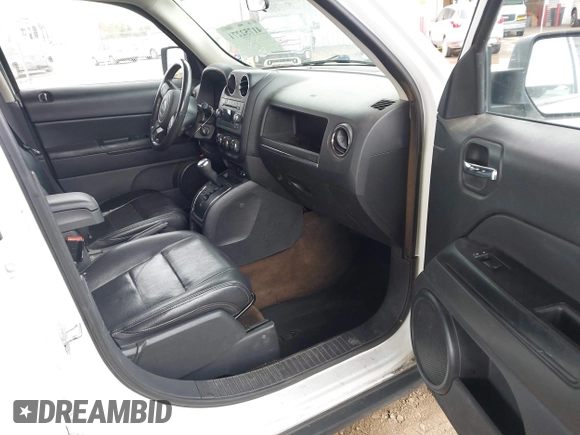 2014 Jeep Patriot High Altitude with VIN 1C4NJPFA0ED667162, listed as a IAAI auction lot 41752271 with 131,038 mi miles and . Bid and sale history available at carsss.com. Image 5.