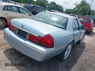 2003 Mercury Grand Marquis LS Premium z VIN 2MEFM75W63X623647, wystawiony jako IAAI lot #42236920 z przebiegiem 162 354 mil mil oraz . Historia ofert i sprzedaży dostępna na DreamBid. Obrazek 4.