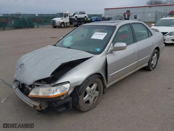 1999 Honda Accord Sdn EX with VIN 1HGCG1657XA060865, listed as a IAAI auction lot 41787307 with 106368 miles. Bid and sale history available at carsss.com. Image 2.