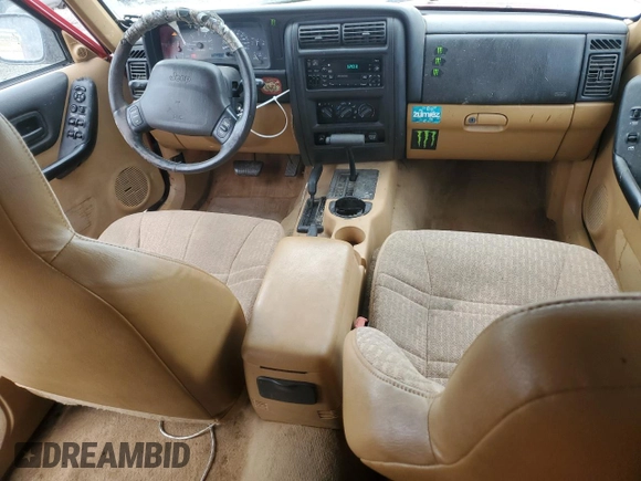 1998 Jeep Cherokee Sport z VIN 1J4FJ68S6WL279262, wystawiony jako Copart lot #56496635 z przebiegiem 160 176 mil mil oraz Czysty tytuł • Clean title. Historia ofert i sprzedaży dostępna na DreamBid. Obrazek 8.