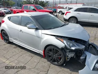 2016 Hyundai Veloster Turbo with VIN KMHTC6AE3GU263387, listed as a IAAI auction lot 42040177 with 96,864 mi miles. Bid and sale history available at carsss.com. Image 1.