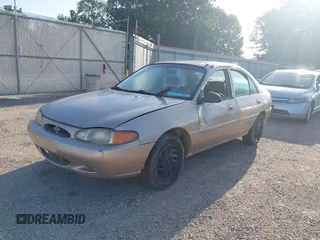 1999 Ford Escort SE z VIN 1FAFP13P5XW268897, wystawiony jako IAAI lot #42844258 z przebiegiem 169 050 mil mil oraz . Historia ofert i sprzedaży dostępna na DreamBid. Obrazek 2.