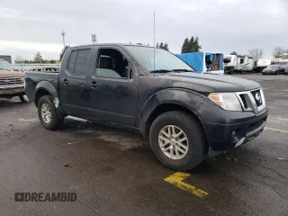 2016 Nissan Frontier S with VIN 1N6AD0EV3GN797075, listed as a Copart auction lot 86207984 with 132,836 mi miles and Salvage title. Bid and sale history available at DreamBid. Image 4.