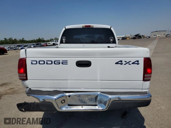 2000 Dodge Dakota Sport with VIN 1B7GG2AN8YS598547, listed as a Copart auction lot 54520985 with 244,605 mi miles and Salvage Title. Bid and sale history available at carsss.com. Image 6.