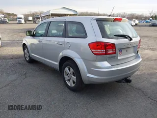 2013 Dodge Journey American Value with VIN 3C4PDCAB3DT610374, listed as a IAAI auction lot 40899147 with 133,386 mi miles and . Bid and sale history available at DreamBid. Image 3.