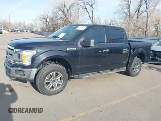 2019 Ford F-150 XL with VIN 1FTEW1E42KFA87194, listed as a IAAI auction lot 41266379 with 89,799 mi miles. Bid and sale history available at carsss.com. Image 2.