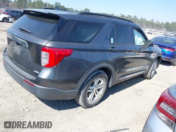 2020 Ford Explorer XLT with VIN 1FMSK7DH0LGB14180, listed as a IAAI auction lot 41671804 with 76,677 mi miles. Bid and sale history available at carsss.com. Image 4.