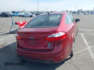 2015 Ford Fiesta SE with VIN 3FADP4BJ9FM113760, listed as a IAAI auction lot 41647960 with 122,868 mi miles. Bid and sale history available at carsss.com. Image 4.
