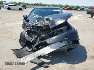 2005 Scion tC z VIN JTKDE177650047383, wystawiony jako Copart lot #55149305 z przebiegiem 176 083 mil mil oraz Szkody całkowita. Historia ofert i sprzedaży dostępna na DreamBid. Obrazek 5.