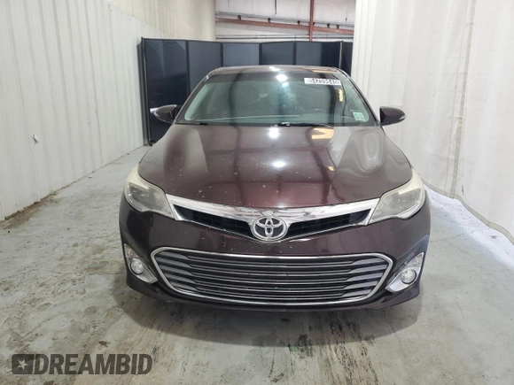 2014 Toyota Avalon Limited z VIN 4T1BK1EB6EU077986, wystawiony jako Copart lot #54209645 z przebiegiem 121 685 mil mil oraz Czysty tytuł • Clean title. Historia ofert i sprzedaży dostępna na DreamBid. Obrazek 5.