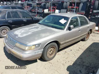 1994 Mercury Grand Marquis LS z VIN 2MELM75W1RX649536, wystawiony jako IAAI lot #41782591 z przebiegiem 111 984 mil mil oraz . Historia ofert i sprzedaży dostępna na DreamBid. Obrazek 2.
