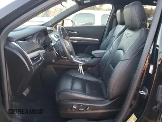 2022 Cadillac XT4 AWD Premium Luxury with VIN 1GYFZDR45NF109999, listed as a Copart auction lot 84618914 with 66,697 mi miles and Clean title. Bid and sale history available at DreamBid. Image 7.