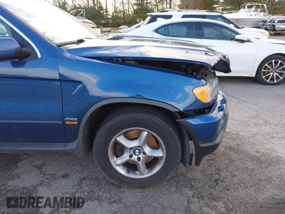 2001 BMW X5 4.4i with VIN WBAFB33501LH24719, listed as a IAAI auction lot 41055076 with 126,530 mi miles. Bid and sale history available at carsss.com. Image 15.