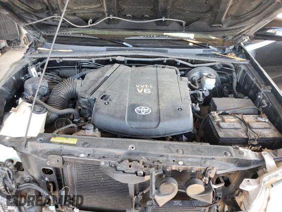 2015 Toyota Tacoma PreRunner with VIN 3TMKU4HN8FM043429, listed as a Copart auction lot 76530604 with 72,736 mi miles and Salvage title. Bid and sale history available at DreamBid. Image 12.